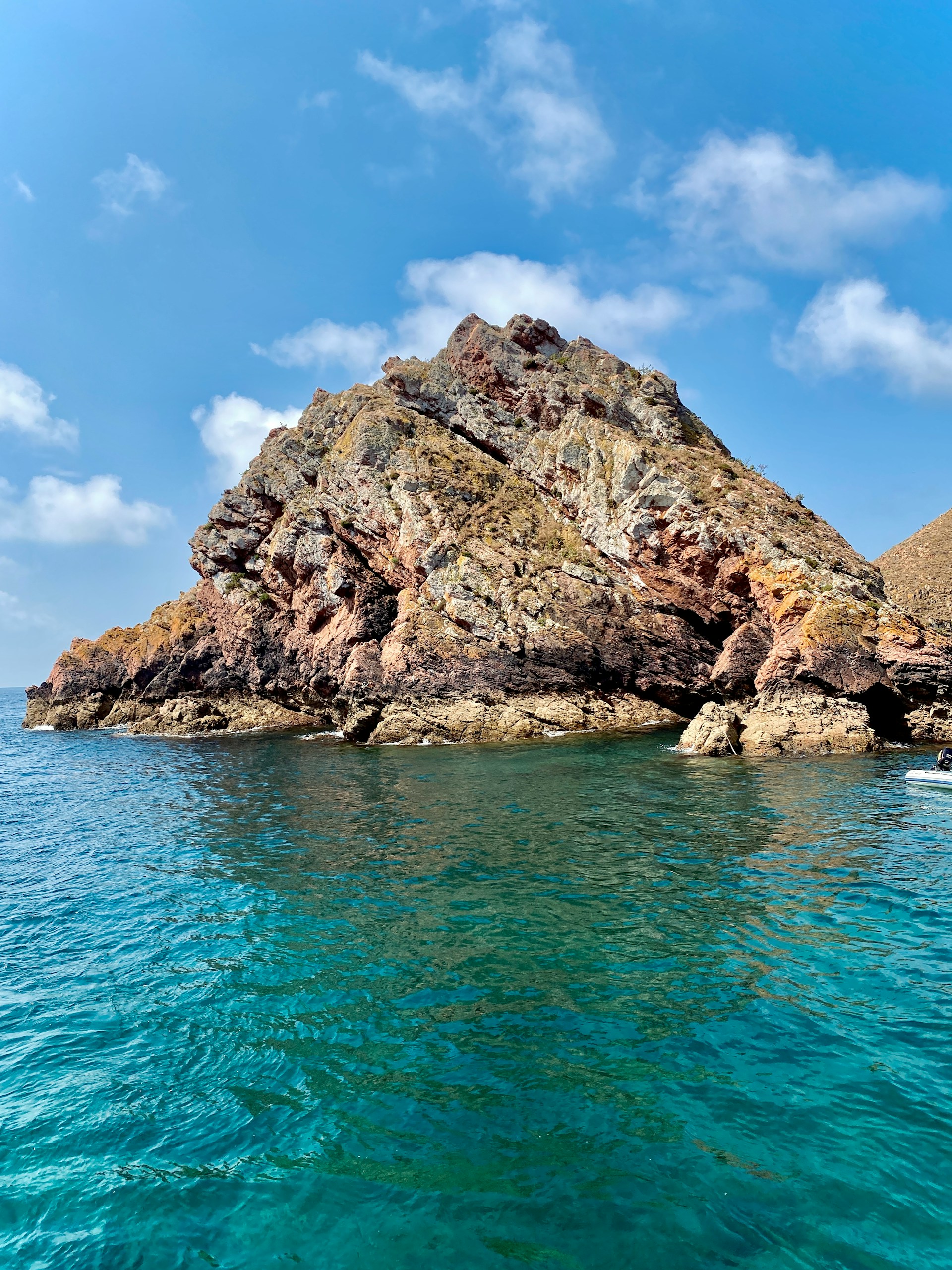 Rocky cliffs and turquoise Atlantic water at Berlenga Grande